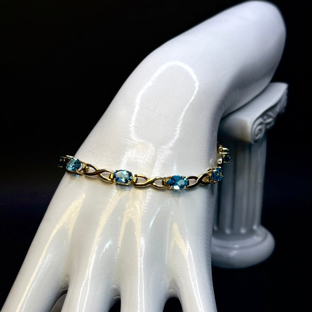 Topaz Tennis Gold Bracelet